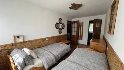 Łóżko lub łóżka w pokoju w obiekcie Na Piotrowickiej Przełęczy
