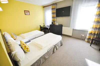 Telewizja i/lub zestaw kina domowego w obiekcie Hotel Trzy Światy Spa & Wellness Rajska WySpa