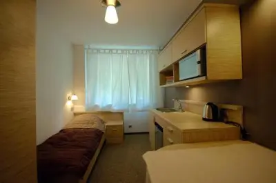 Łóżko lub łóżka w pokoju w obiekcie Platinium Centrum