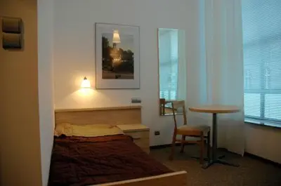 Łóżko lub łóżka w pokoju w obiekcie Platinium Centrum