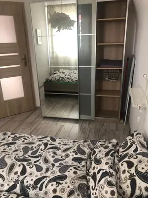 Łóżko lub łóżka w pokoju w obiekcie Mieszkanie Na Placu Solnym