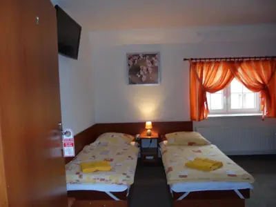 Łóżko lub łóżka w pokoju w obiekcie Agroturystyka Krysia Pilszcz