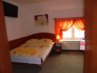 Łóżko lub łóżka w pokoju w obiekcie Agroturystyka Krysia Pilszcz