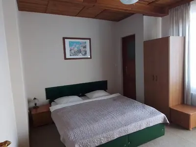 Łóżko lub łóżka w pokoju w obiekcie Willa Kaja