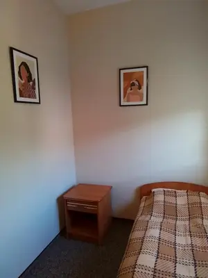 Łóżko lub łóżka w pokoju w obiekcie Willa Kaja