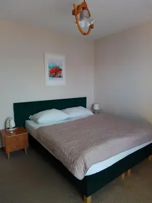 Łóżko lub łóżka w pokoju w obiekcie Willa Kaja