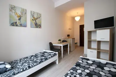Łóżko lub łóżka w pokoju w obiekcie Vanilla Hostel Wrocław