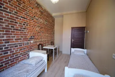 Łóżko lub łóżka w pokoju w obiekcie Vanilla Hostel Wrocław