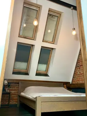 Łóżko lub łóżka w pokoju w obiekcie Apartamenty Młyńska 4