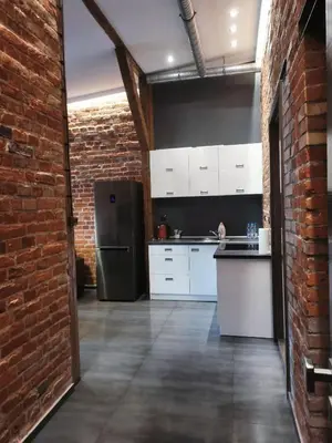 Kuchnia lub aneks kuchenny w obiekcie Apartamenty Młyńska 4
