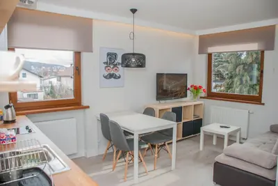 Telewizja i/lub zestaw kina domowego w obiekcie Apartamenty Akacjowa przy Parku Szwedzkim