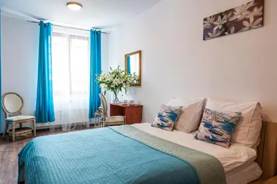 Łóżko lub łóżka w pokoju w obiekcie Galeria Italiana Apartments