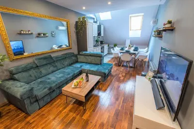 Telewizja i/lub zestaw kina domowego w obiekcie Galeria Italiana Apartments