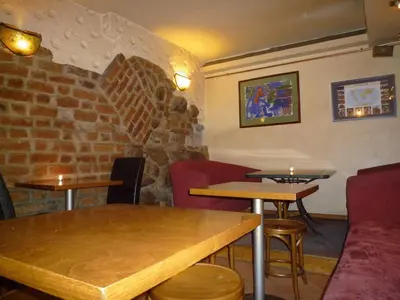 Część wypoczynkowa w obiekcie Academus Pub & Guest House