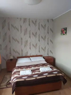 Łóżko lub łóżka w pokoju w obiekcie Apartamenty KAJA