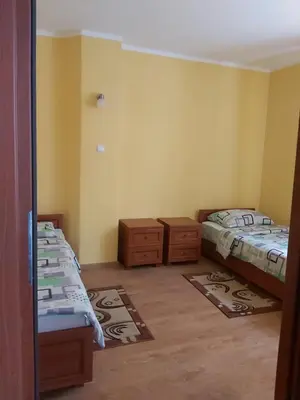 Łóżko lub łóżka w pokoju w obiekcie Apartamenty KAJA