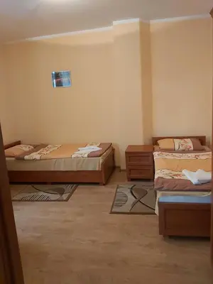 Łóżko lub łóżka w pokoju w obiekcie Apartamenty KAJA