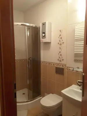 Łazienka w obiekcie Apartamenty KAJA