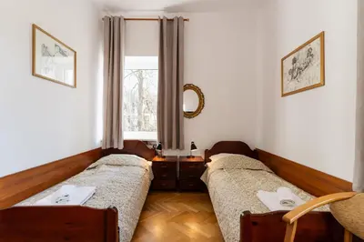 Łóżko lub łóżka w pokoju w obiekcie Hotel Europa