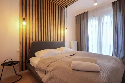 Łóżko lub łóżka w pokoju w obiekcie Boogie Apartments