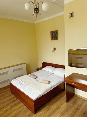 Łóżko lub łóżka w pokoju w obiekcie Hotel Lubavia
