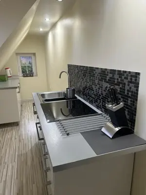 Kuchnia lub aneks kuchenny w obiekcie Apartamenty Stokrotka