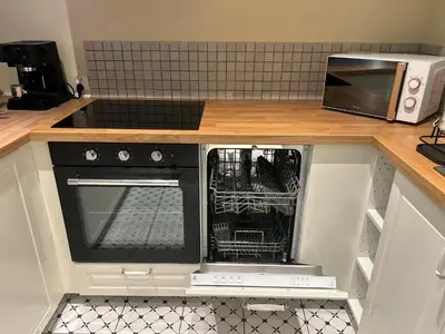 Kuchnia lub aneks kuchenny w obiekcie Apartamenty Stokrotka
