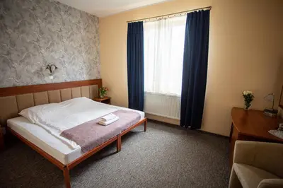 Łóżko lub łóżka w pokoju w obiekcie Hotel pod Wierzba