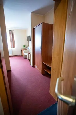 Łóżko lub łóżka w pokoju w obiekcie Hotel pod Wierzba