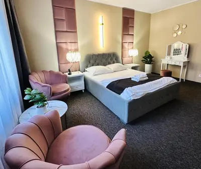 Łóżko lub łóżka w pokoju w obiekcie Rezydencja Rosato