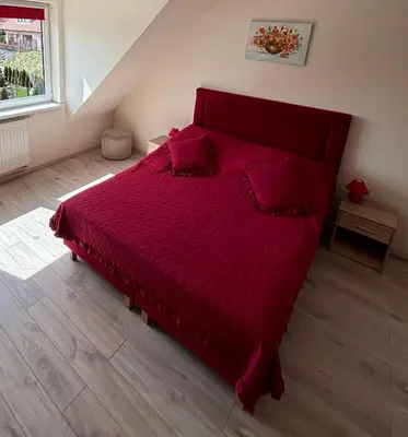 Łóżko lub łóżka w pokoju w obiekcie Słoneczne Apartamenty Polanica-Zdrój