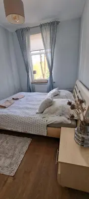 Łóżko lub łóżka w pokoju w obiekcie Apartament Bukowe Wzgórze