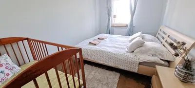 Łóżko lub łóżka w pokoju w obiekcie Apartament Bukowe Wzgórze