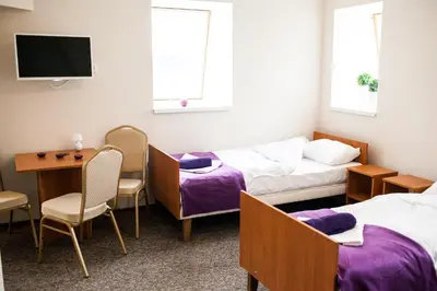 Łóżko lub łóżka w pokoju w obiekcie Lawendowy Ogród