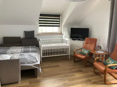 Łóżko lub łóżka w pokoju w obiekcie Noclegi pod kasztanem