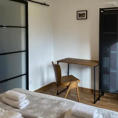 Łóżko lub łóżka w pokoju w obiekcie Centrum Łąkowa 1