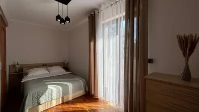 Łóżko lub łóżka w pokoju w obiekcie Mala Italia Apartments