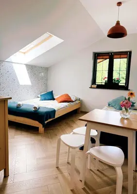 Łóżko lub łóżka w pokoju w obiekcie Camper Park Radków - domki i pokoje
