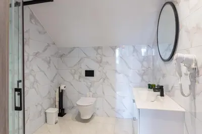 Łazienka w obiekcie Apartamenty i pokoje Montana