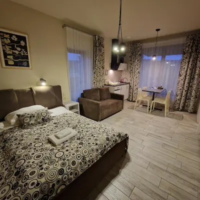 Łóżko lub łóżka w pokoju w obiekcie Tajemniczy Ogród Szczytna - Bed & Breakfast