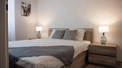 Łóżko lub łóżka w pokoju w obiekcie Apartament Piano