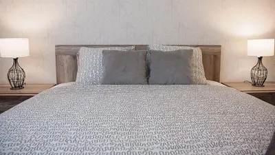 Łóżko lub łóżka w pokoju w obiekcie Apartament Piano
