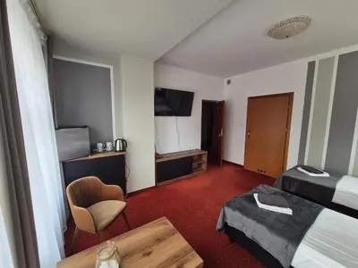 Telewizja i/lub zestaw kina domowego w obiekcie Apartamenty Amadeus & Trattoria Matteo e Raffaello