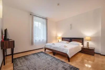 Łóżko lub łóżka w pokoju w obiekcie Villa Tilia