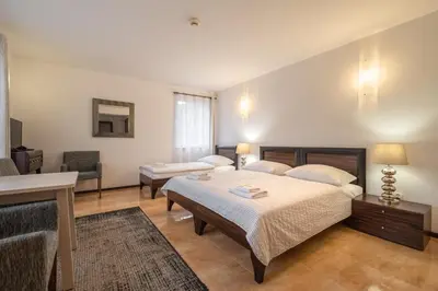 Łóżko lub łóżka w pokoju w obiekcie Villa Tilia
