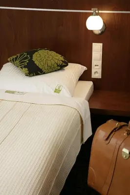 Łóżko lub łóżka w pokoju w obiekcie Hotel Azyl
