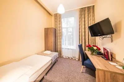 Telewizja i/lub zestaw kina domowego w obiekcie Hotel Lothus