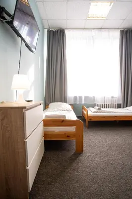 Łóżko lub łóżka w pokoju w obiekcie Moon Hostel Wrocław