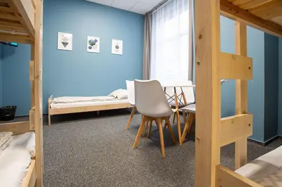 Łóżko lub łóżka w pokoju w obiekcie Moon Hostel Wrocław