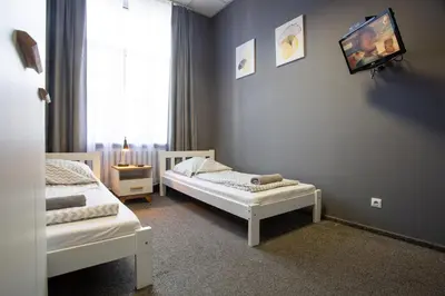Łóżko lub łóżka w pokoju w obiekcie Moon Hostel Wrocław